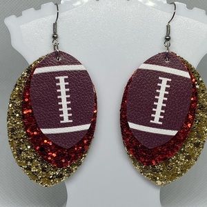 Glitter football earrings made with faux leather.